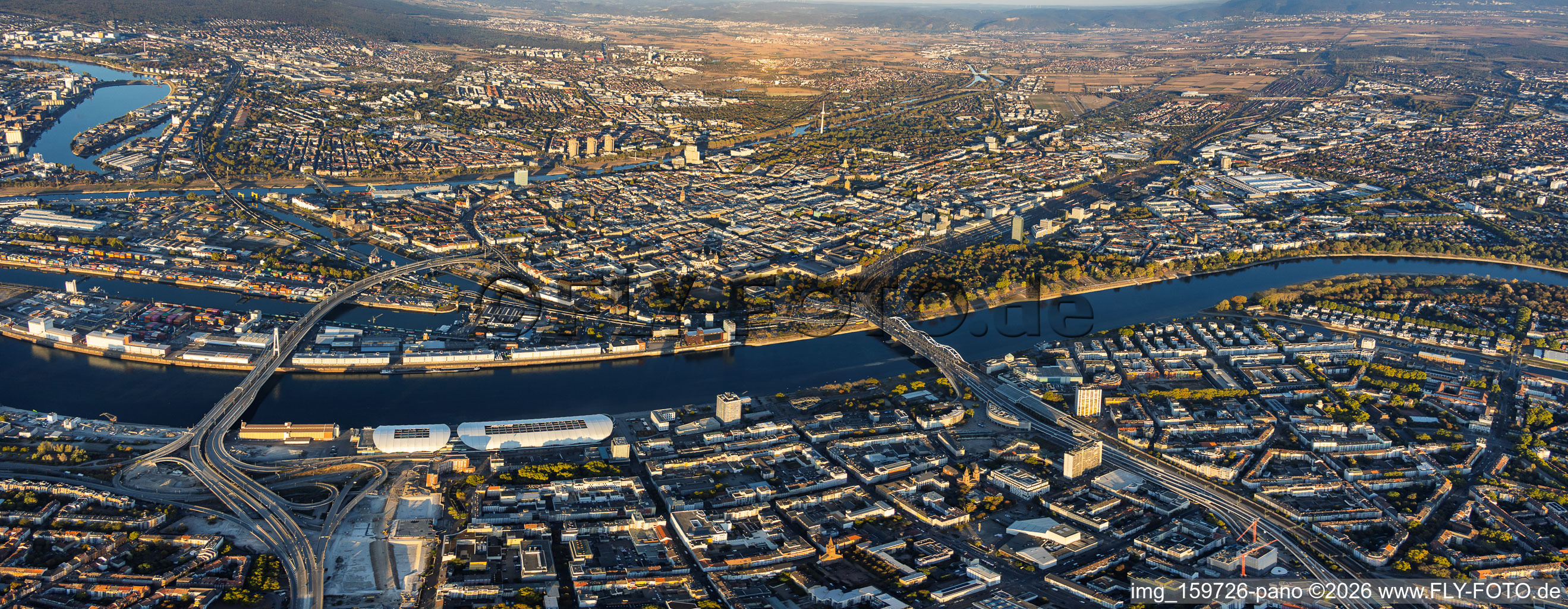 City panorama from the west (across the Rhine), spanning from the Rhine harbor to Parkinsel, between the Kurt-Schumacher-Brücke (B44) and Konrad-Adenauer-Brücke (B37) bridges, viewed from Ludwigshafen in the district Innenstadt in Mannheim in the state Baden-Wuerttemberg, Germany
