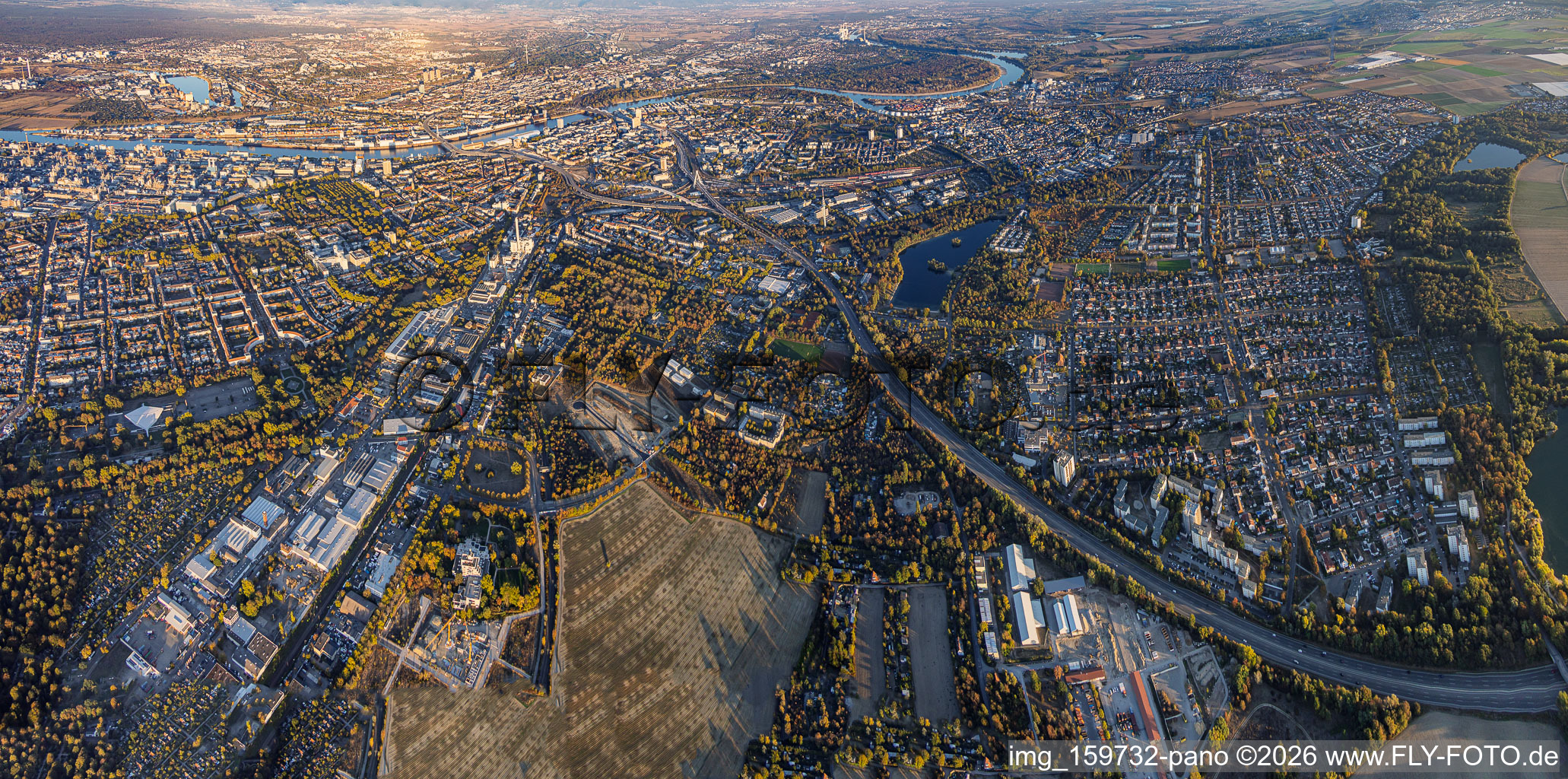 City panorama from the south, spanning from BASF and Gartenstadt to the Rhine in the district Mitte in Ludwigshafen in the state Rhineland-Palatinate, Germany