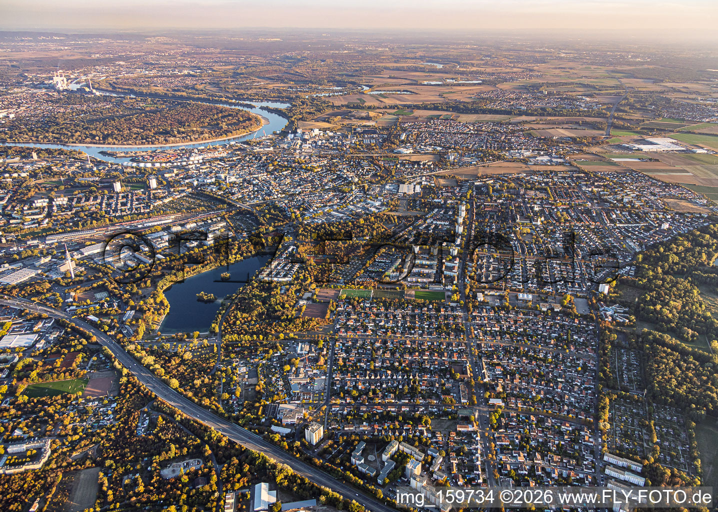 City overview from the north, extending to Rheingönheim in the district Gartenstadt in Ludwigshafen in the state Rhineland-Palatinate, Germany