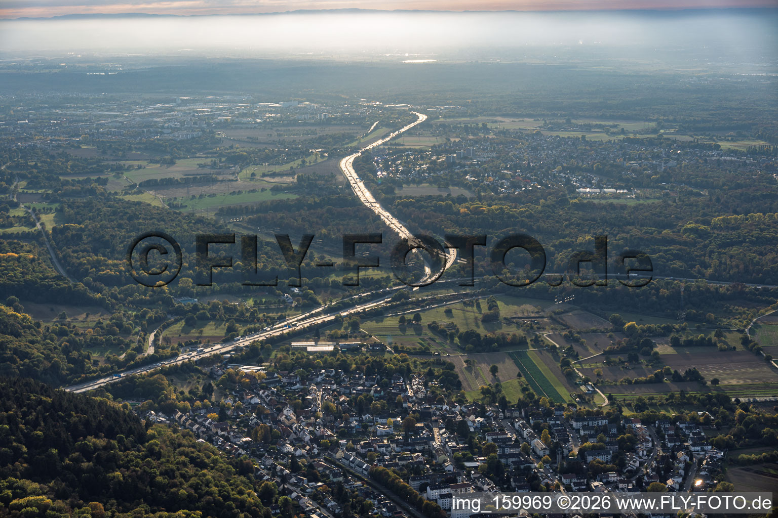Motorway interchange (junction) with the A5 and A6 in the evening in the district Wolfartsweier in Karlsruhe in the state Baden-Wuerttemberg, Germany