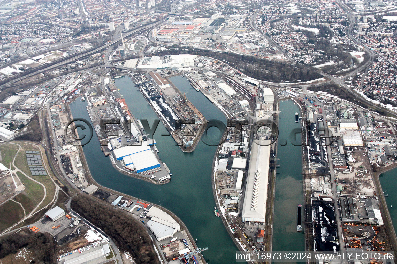 The port Rheinhafen of the city Karlsruhe in the state Baden-Wuerttemberg. The inland harbor provides access to the river Rhine and consists of six basins. It is operated by KVVH, short term for Karlsruher Versorgungs-, Verkehrs- und Hafen GmbH