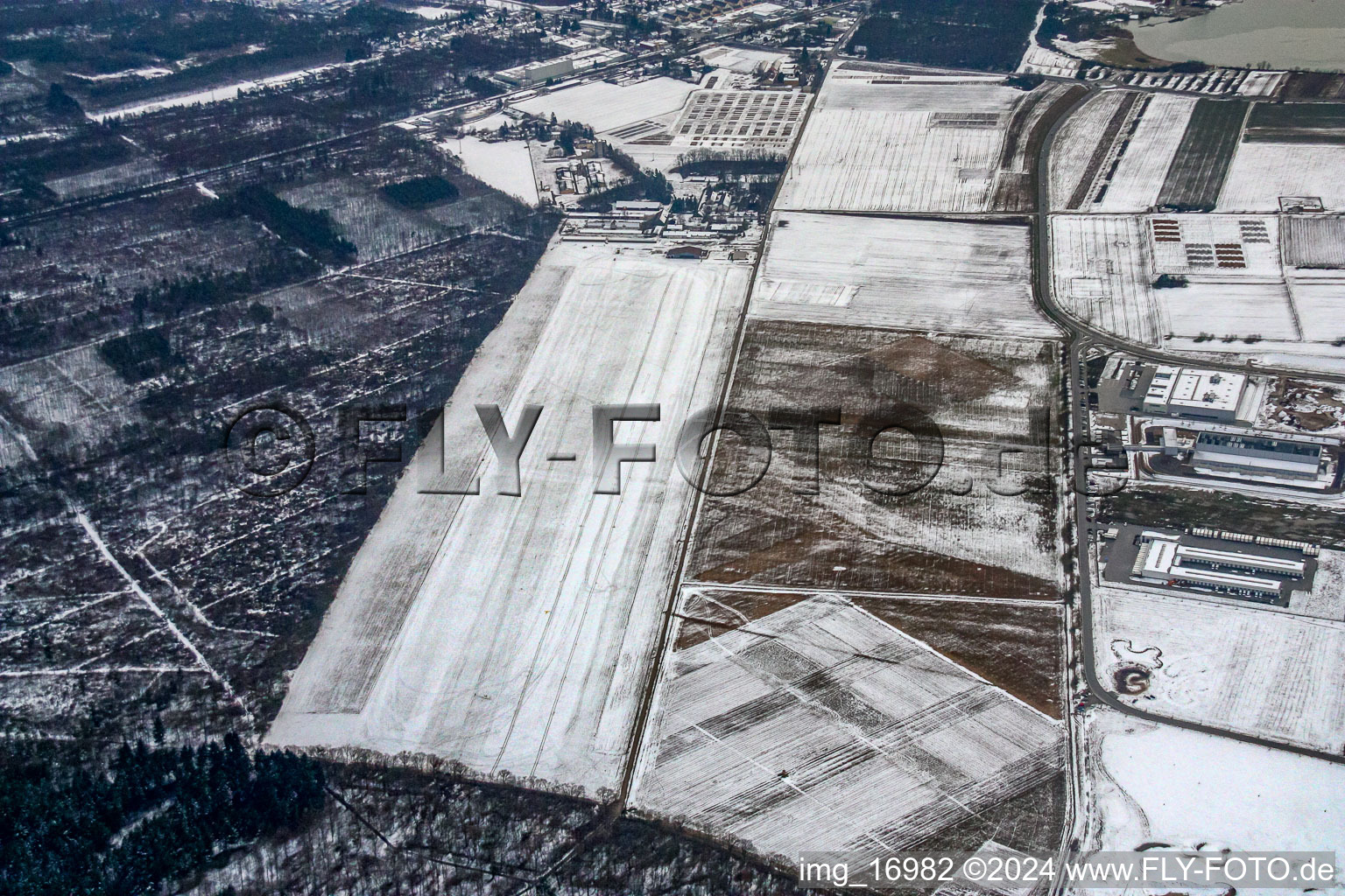 Wintry snowy Gliding field on the airfield of Segelfluggelaende Rheinstetten in Rheinstetten in the state Baden-Wurttemberg, Germany