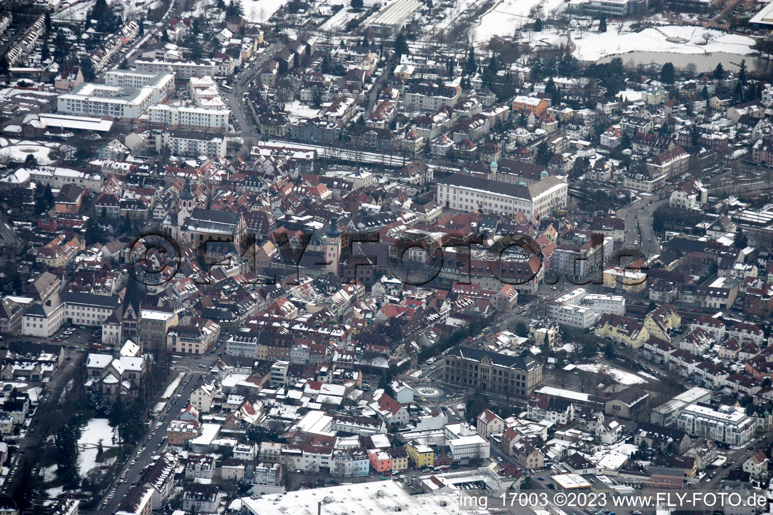 Aerial view of Wintry snowy Town View of the streets and houses of the residential areas in Ettlingen in the state Baden-Wurttemberg