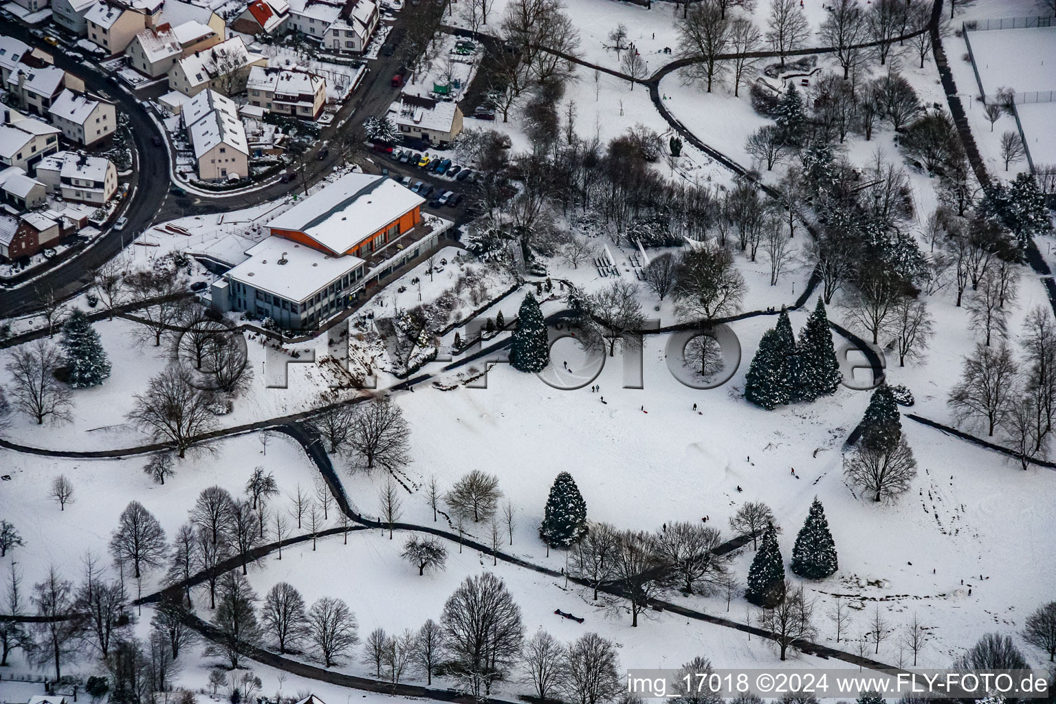 Wintry snowy Park of Kurpark with Herzog Kaffee in Reichenbach in the state Baden-Wurttemberg, Germany