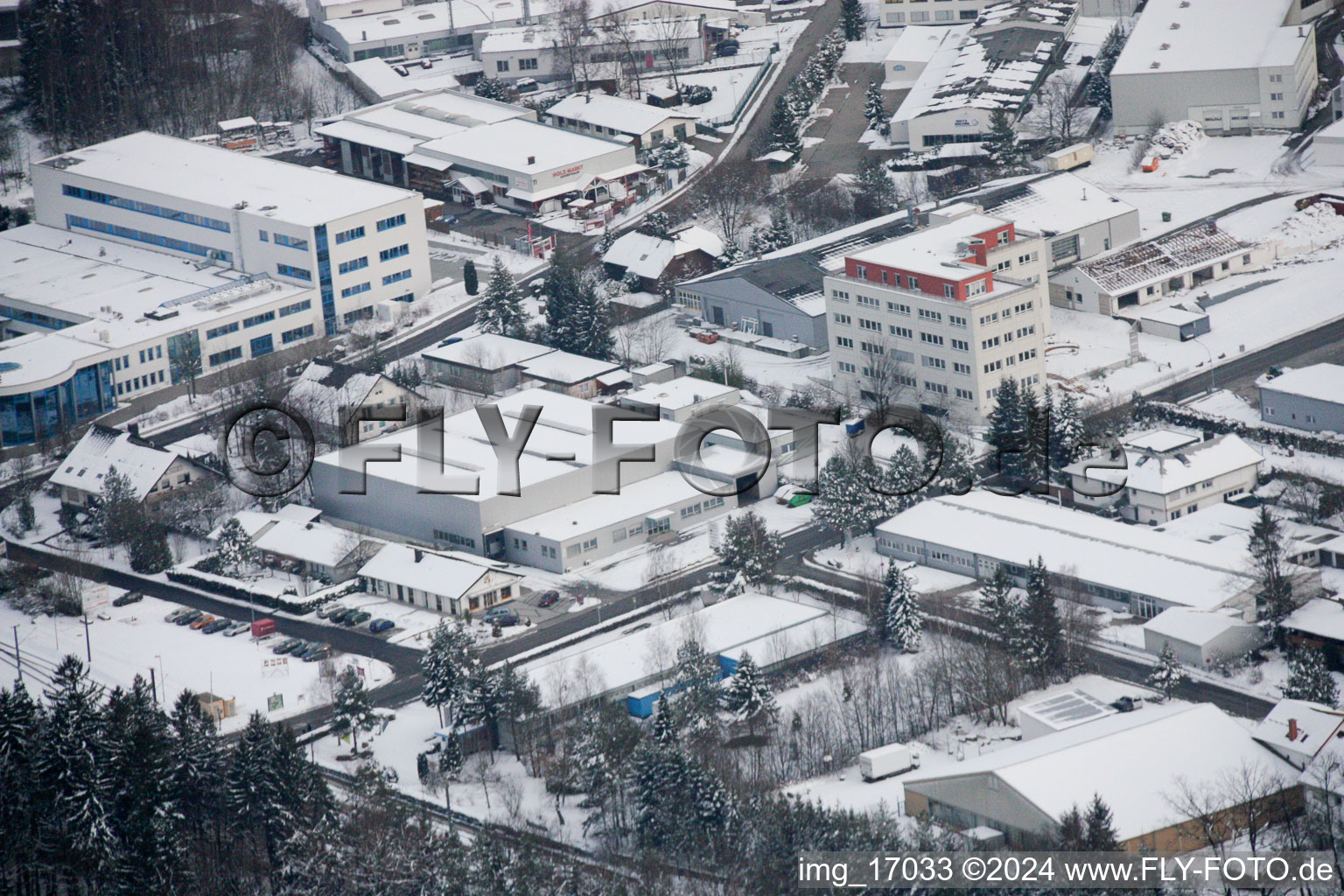 Wintry snowy Industrial and commercial area in the district Ittersbach in Karlsbad in the state Baden-Wurttemberg