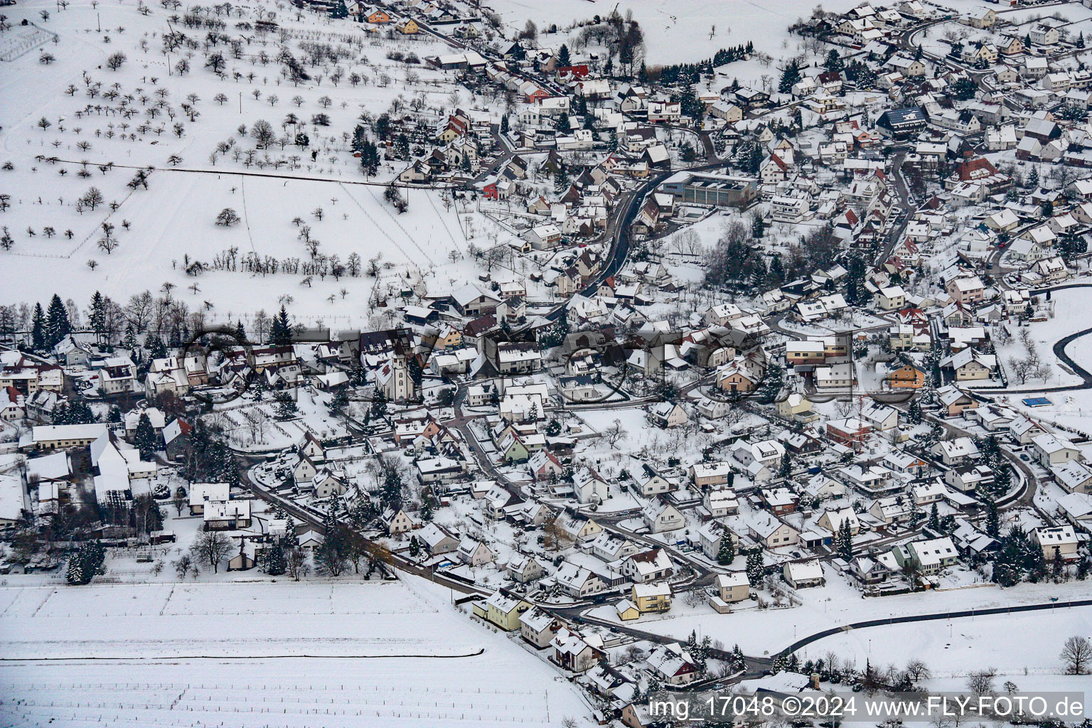 Aerial view of In the snow in the district Ottenhausen in Straubenhardt in the state Baden-Wuerttemberg, Germany