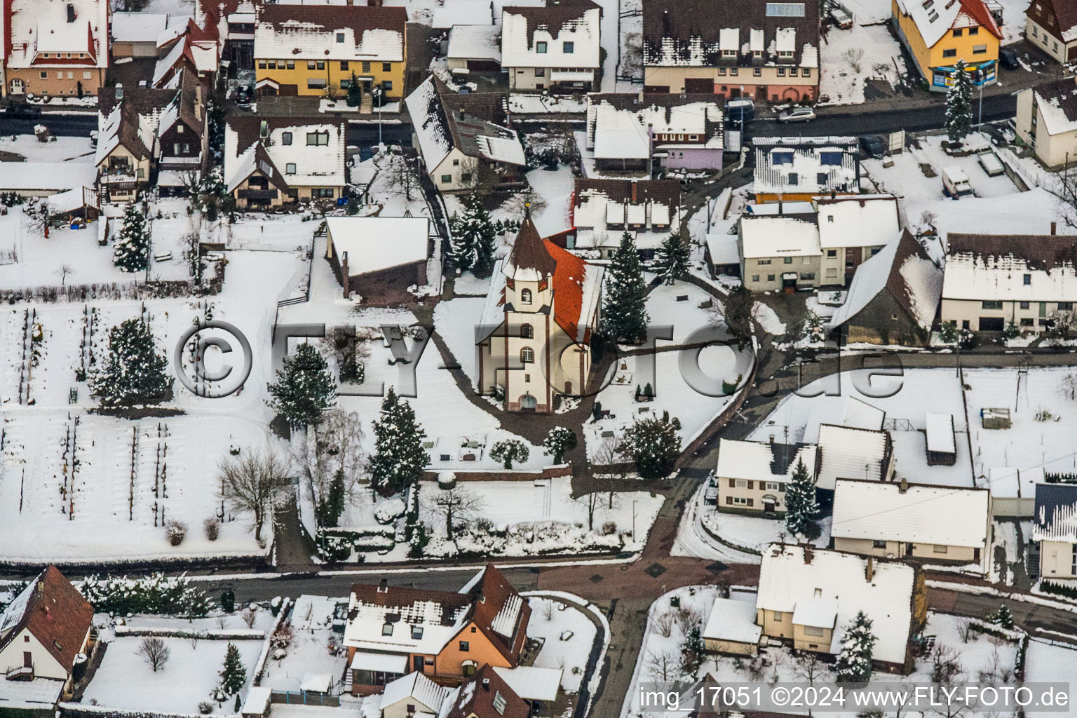 Wintry snowy Church building Evangelic Church in Ottenhausen in the state Baden-Wurttemberg, Germany