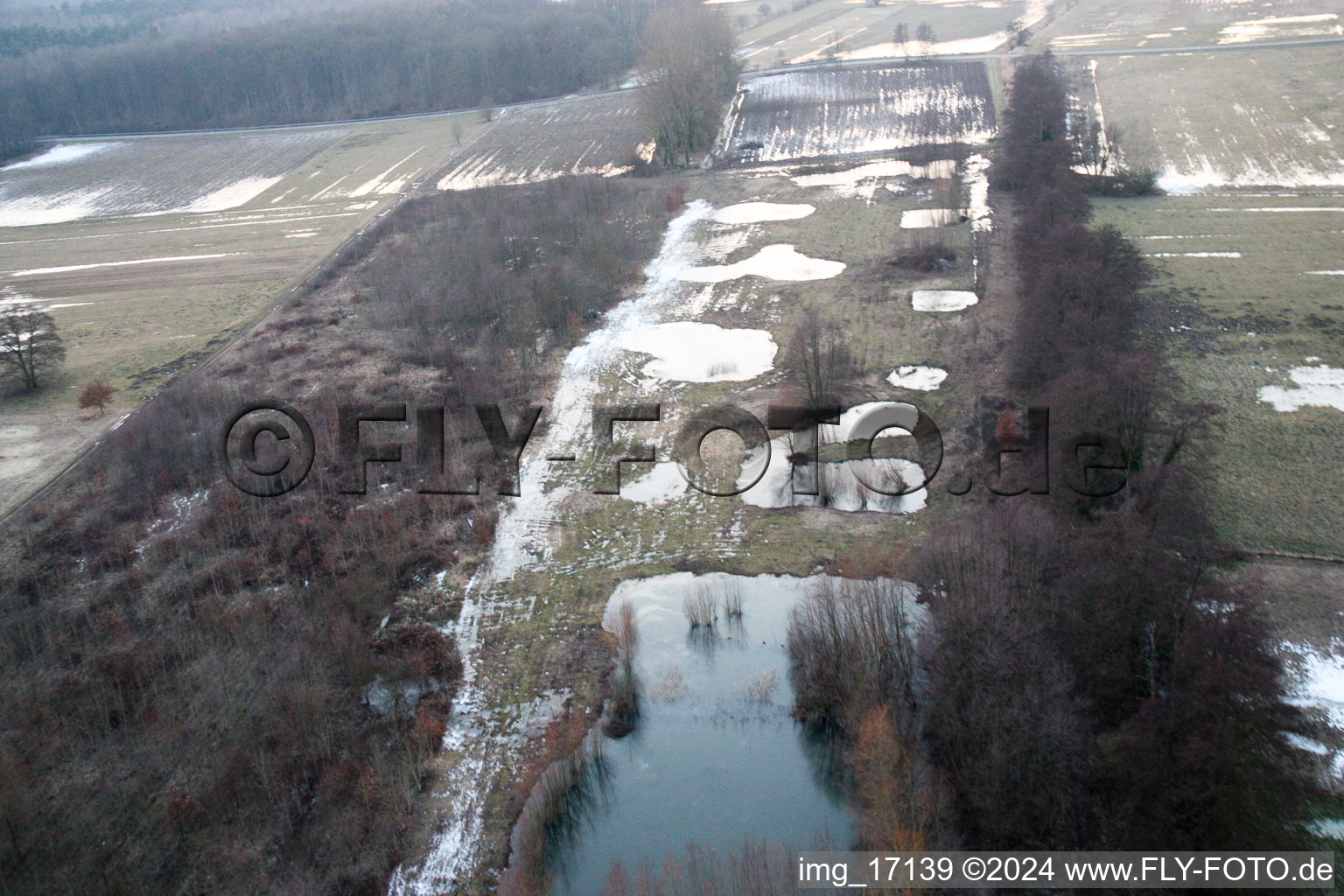 Aerial view of Otterbachtal meadows flooded by meltwater in Kandel in the state Rhineland-Palatinate, Germany