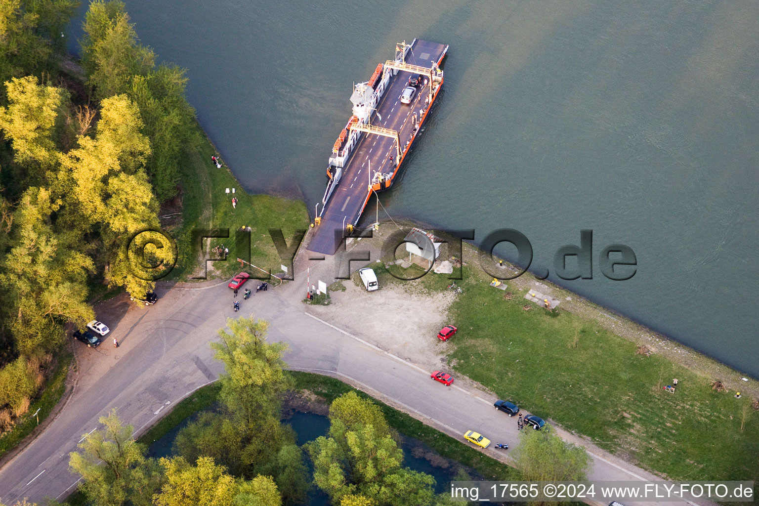 Ride a ferry ship across the Rhine in Leimersheim in the state Rhineland-Palatinate, Germany