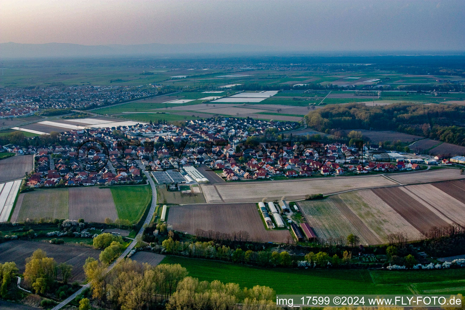 Aerial photograpy of Village - view on the edge of agricultural fields and farmland in Kuhardt in the state Rhineland-Palatinate