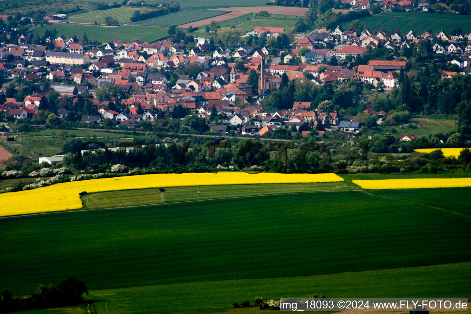 Village - view on the edge of agricultural fields and farmland in Ebertsheim in the state Rhineland-Palatinate