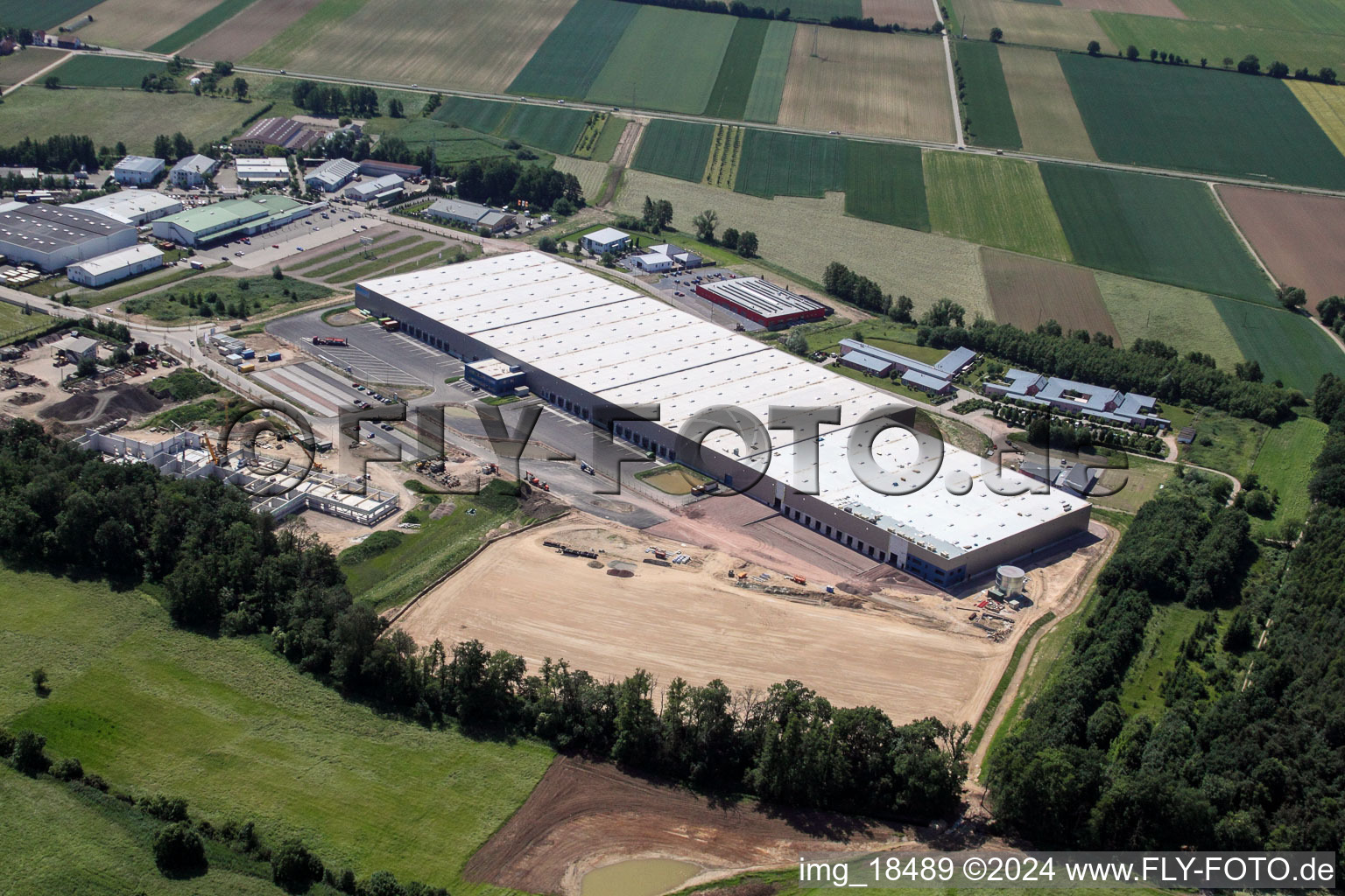 Oblique view of New building construction site in the industrial park Horst for Friedrich Zufall GmbH & Co. KG Internationale Spedition in the district Gewerbegebiet Horst in Kandel in the state Rhineland-Palatinate, Germany