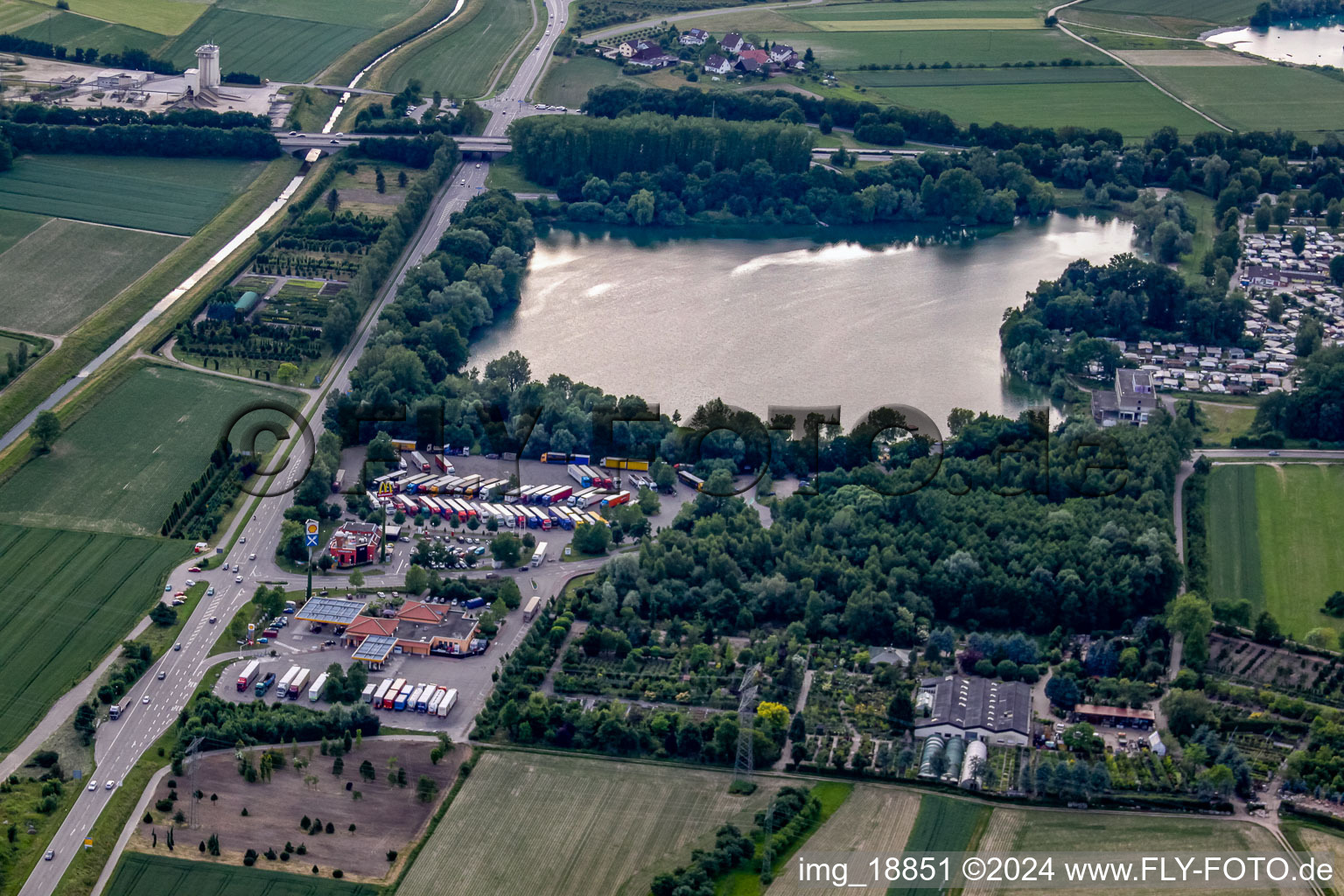 Truck parking at Achernsee in the district Großweier in Achern in the state Baden-Wuerttemberg, Germany