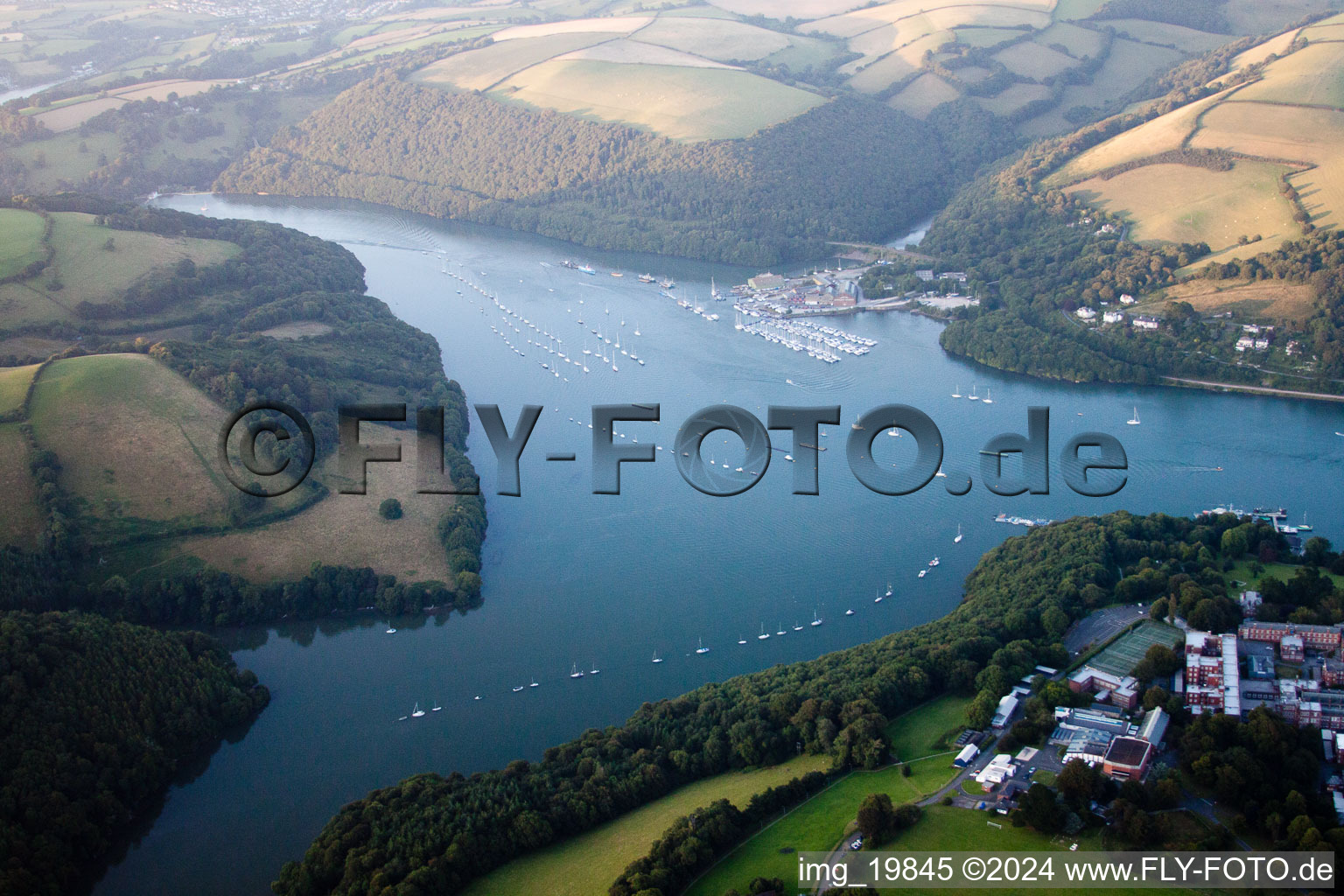Aerial view of Riparian areas along the river mouth of Dart river in Dartmouth in England, United Kingdom