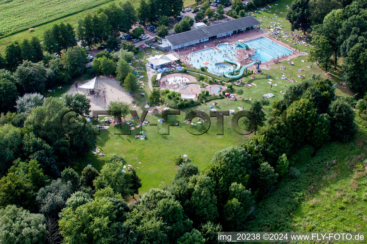 Aerial view of Waterslide on Swimming pool of the Waldschwimmbad Kandel in Kandel in the state Rhineland-Palatinate, Germany