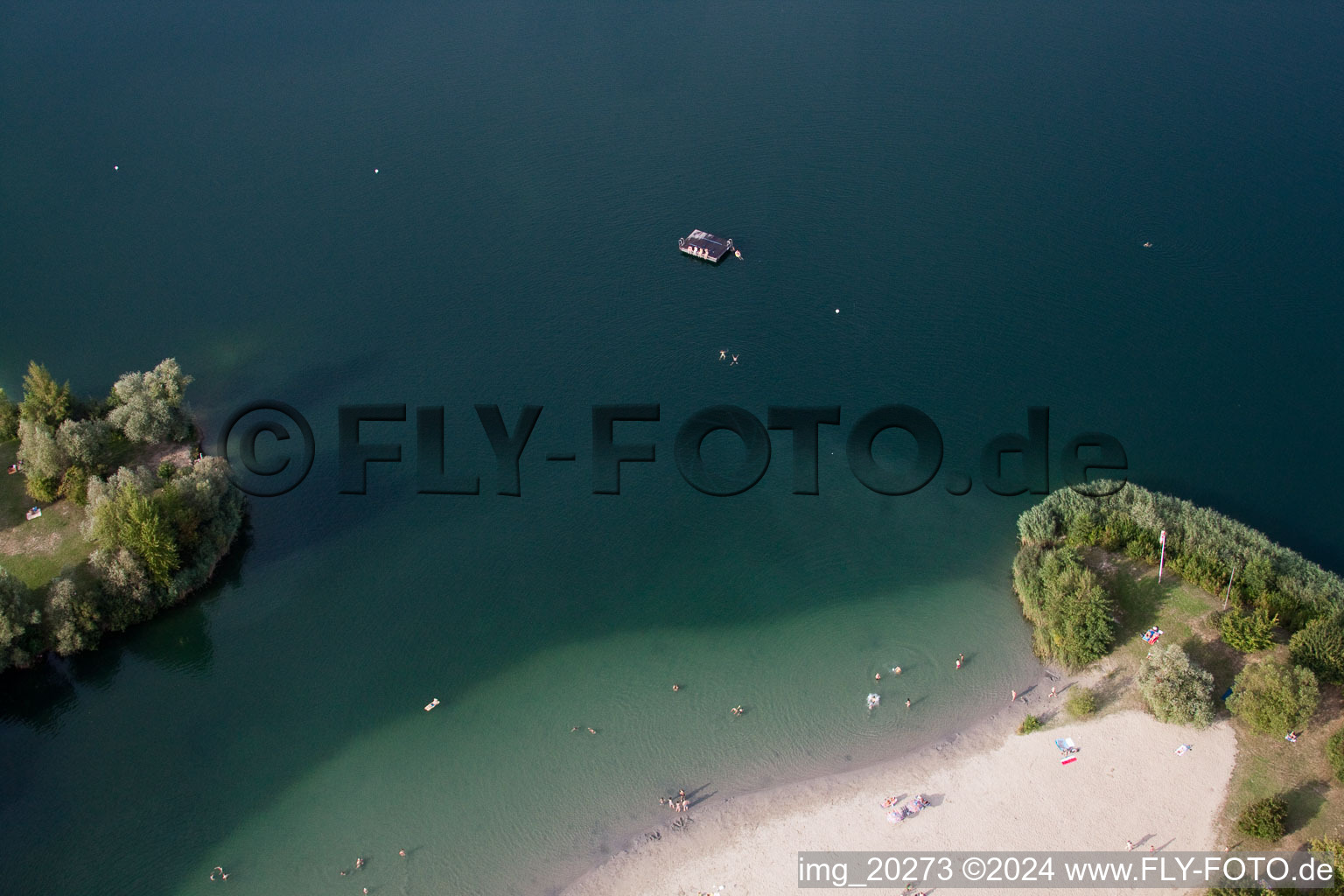 Sandy beach areas on the quarry lake Johanneswiese in Jockgrim in the state Rhineland-Palatinate