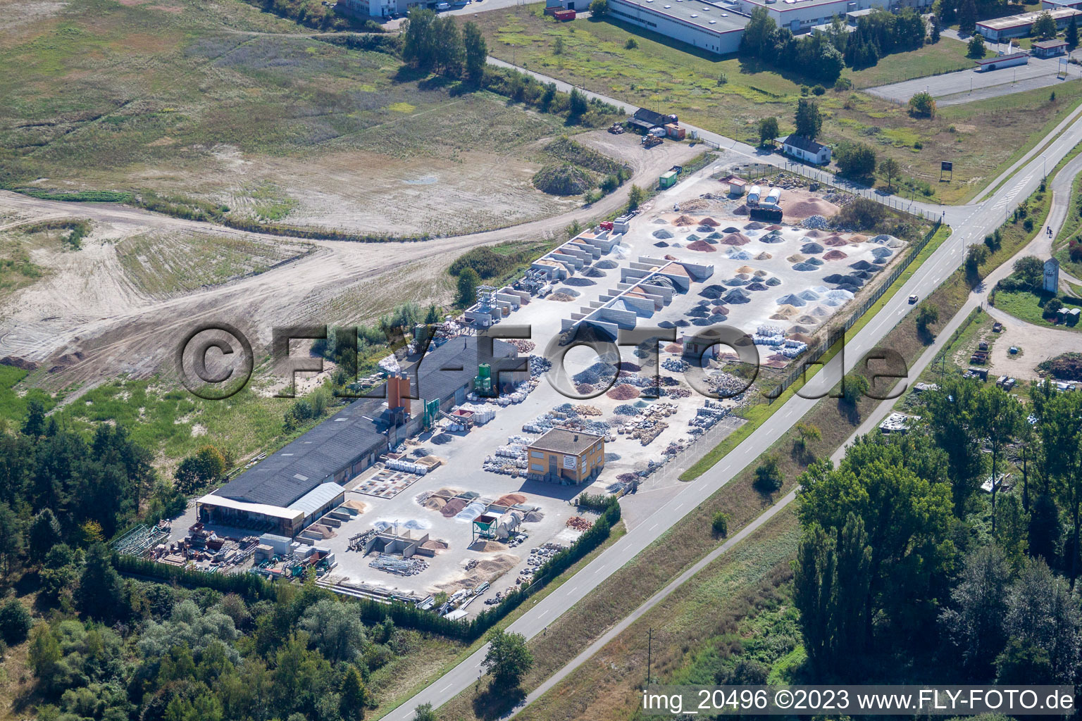 Garden gravel company, Badische Terrazzo Handelsgesellschaft mbH Huttenheimer Landstrasse 2-6 in the district Neudorf in Graben-Neudorf in the state Baden-Wuerttemberg, Germany seen from above