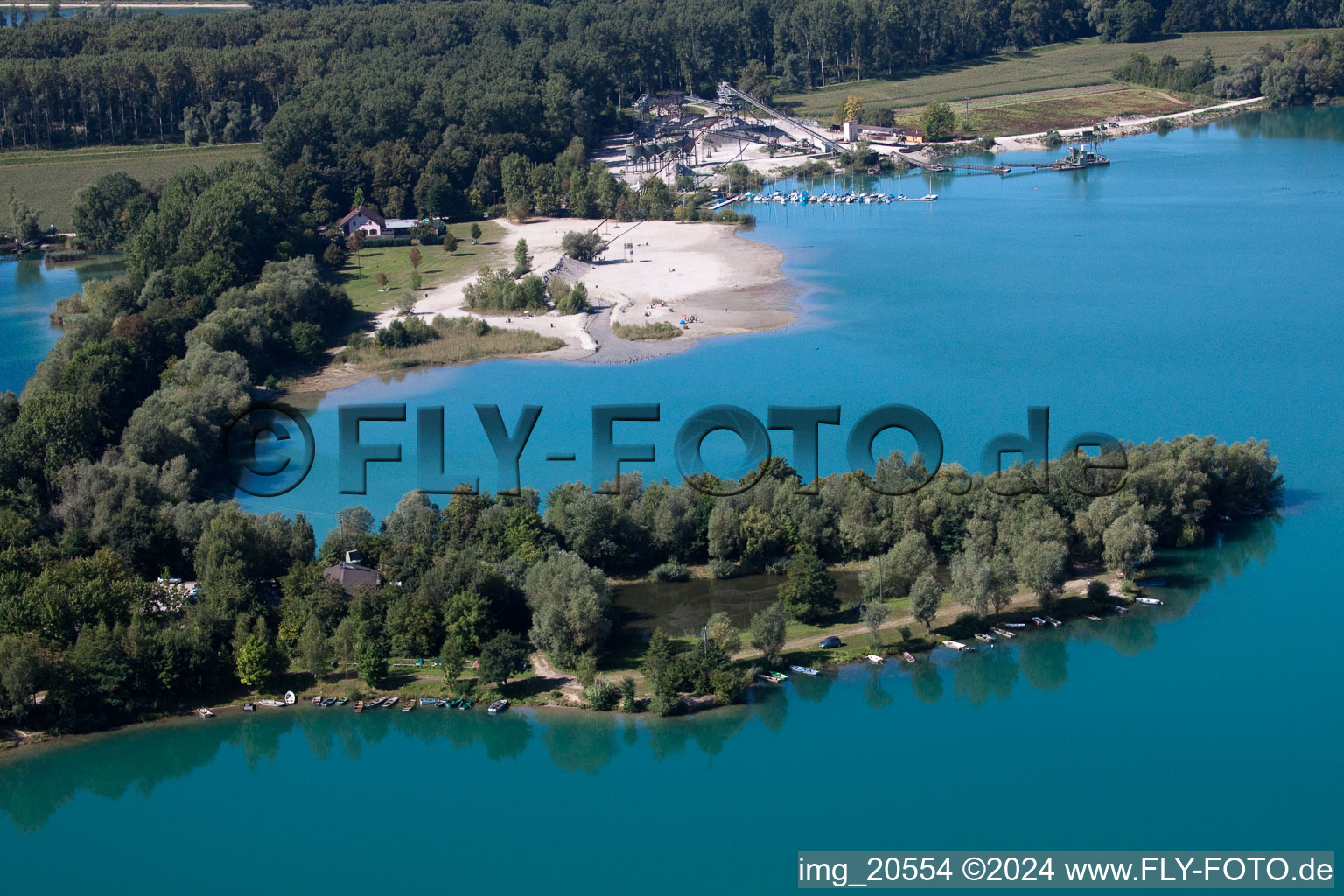 Fisherman's home, beach and Heidelberg Materials Mineralik at the Giessen quarry lake in the district Liedolsheim in Dettenheim in the state Baden-Wuerttemberg, Germany