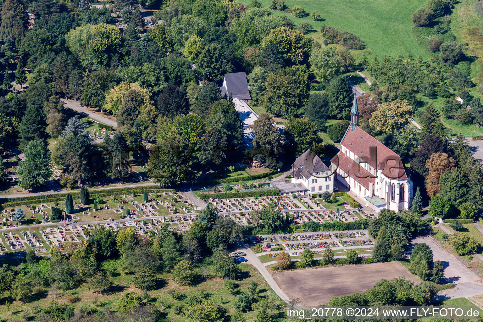 Grave rows on the grounds of the cemetery of Weingartenkirche in Zell-Weierbach in the state Baden-Wurttemberg, Germany