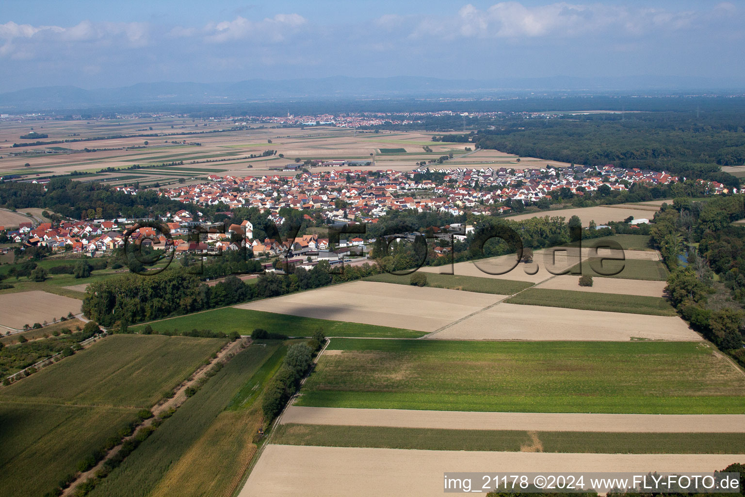 Aerial photograpy of Village - view on the edge of agricultural fields and farmland in Hoerdt in the state Rhineland-Palatinate
