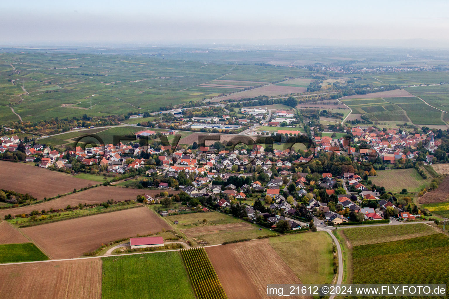 Village - view on the edge of agricultural fields and farmland in Gundersheim in the state Rhineland-Palatinate, Germany