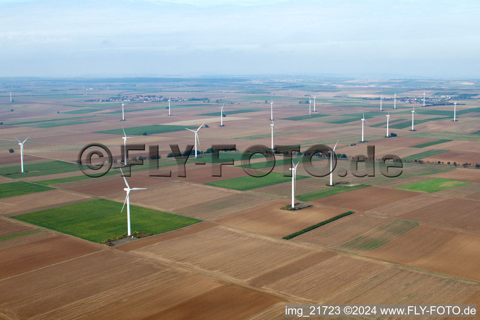 Wind turbine windmills on a field in Flomborn in the state Rhineland-Palatinate