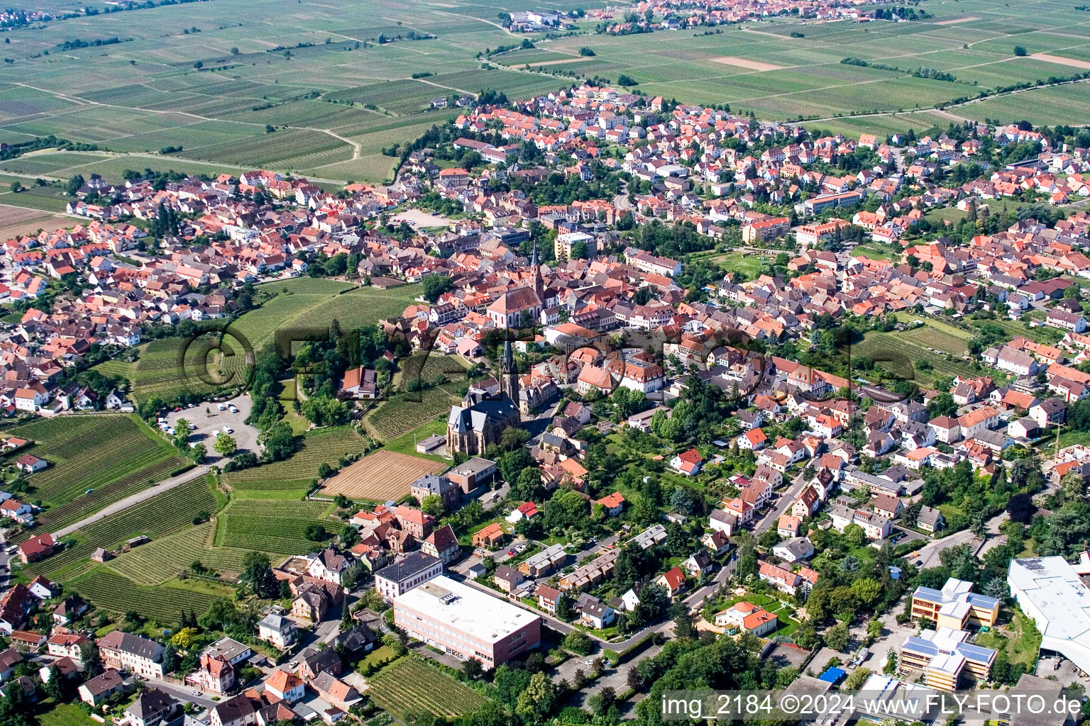 Village - view on the edge of agricultural fields and farmland in Edenkoben in the state Rhineland-Palatinate