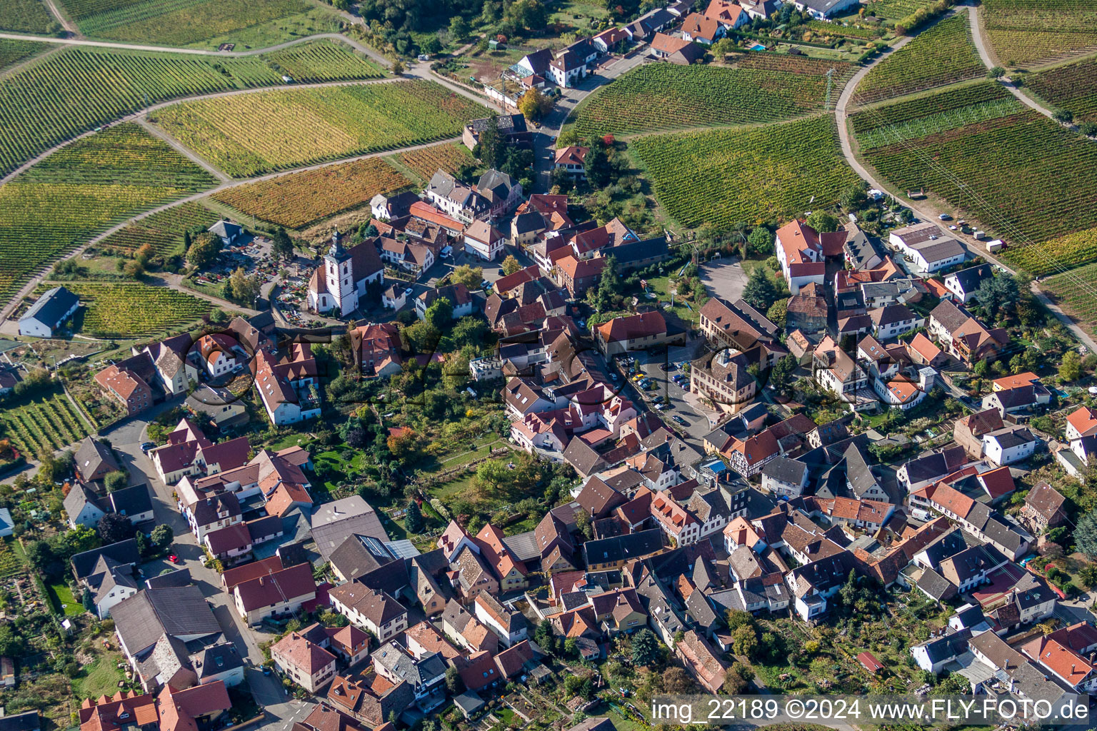 Village - view on the edge of agricultural fields and farmland in Weyher in der Pfalz in the state Rhineland-Palatinate, Germany