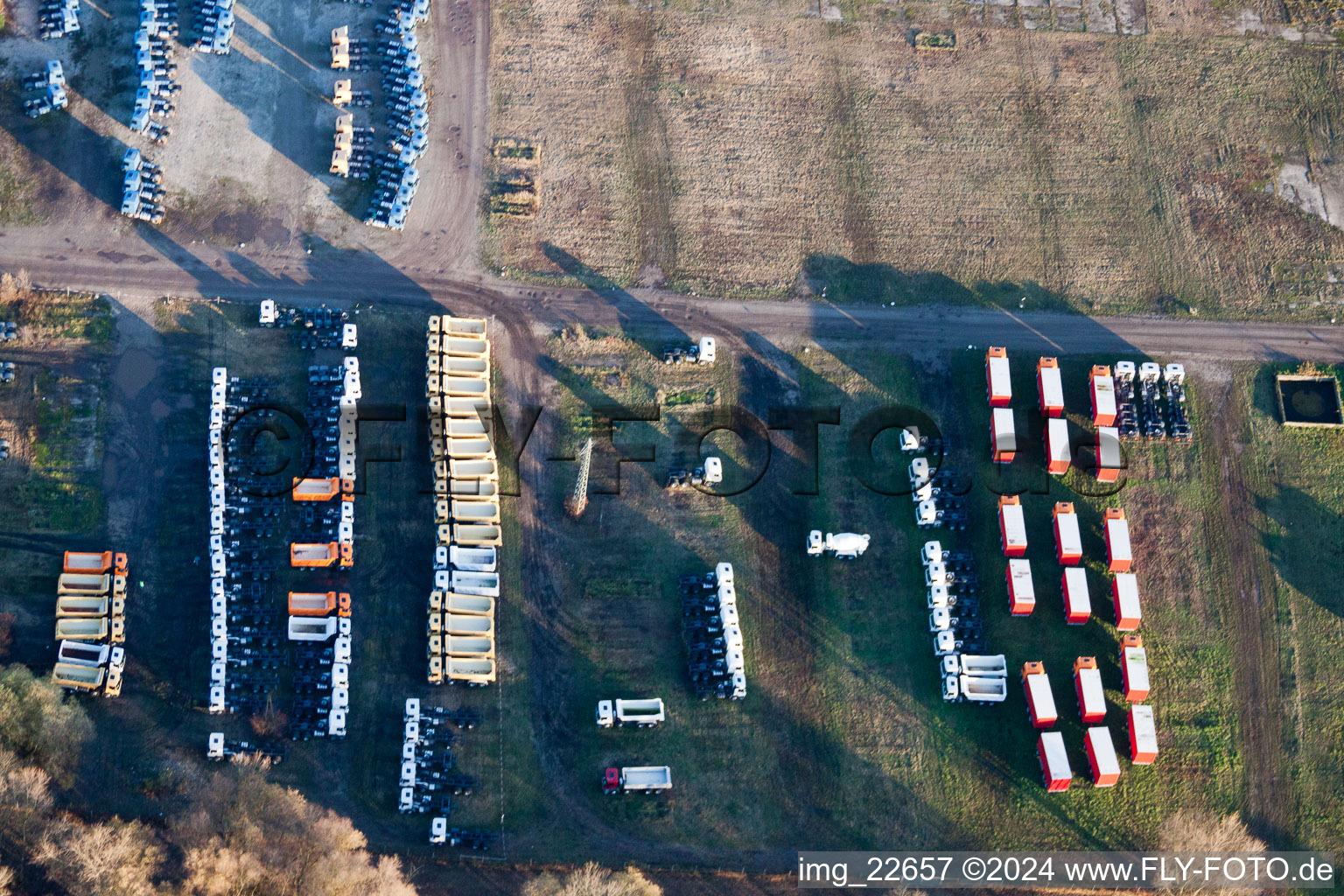 Truck storage on the Rhine in the district Maximiliansau in Wörth am Rhein in the state Rhineland-Palatinate, Germany from above