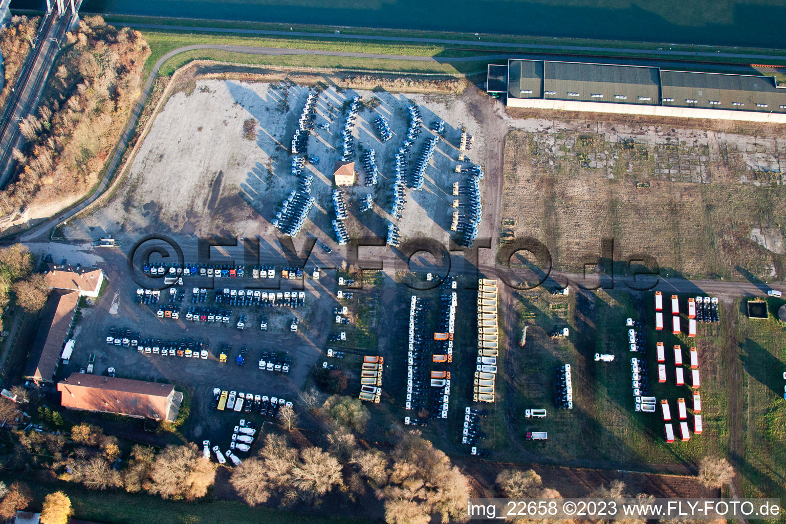 Truck warehouse on the Rhine in the district Maximiliansau in Wörth am Rhein in the state Rhineland-Palatinate, Germany out of the air