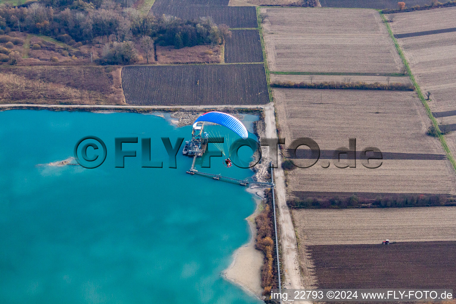 Quarry lake in Hagenbach in the state Rhineland-Palatinate, Germany from the plane