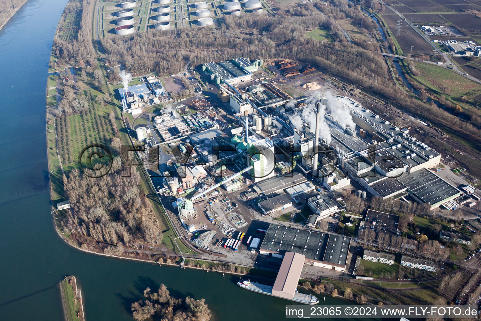 Aerial view of Building and production halls on the premises of Papierfabrik Stora Enso in the district Maxau in Karlsruhe in the state Baden-Wurttemberg