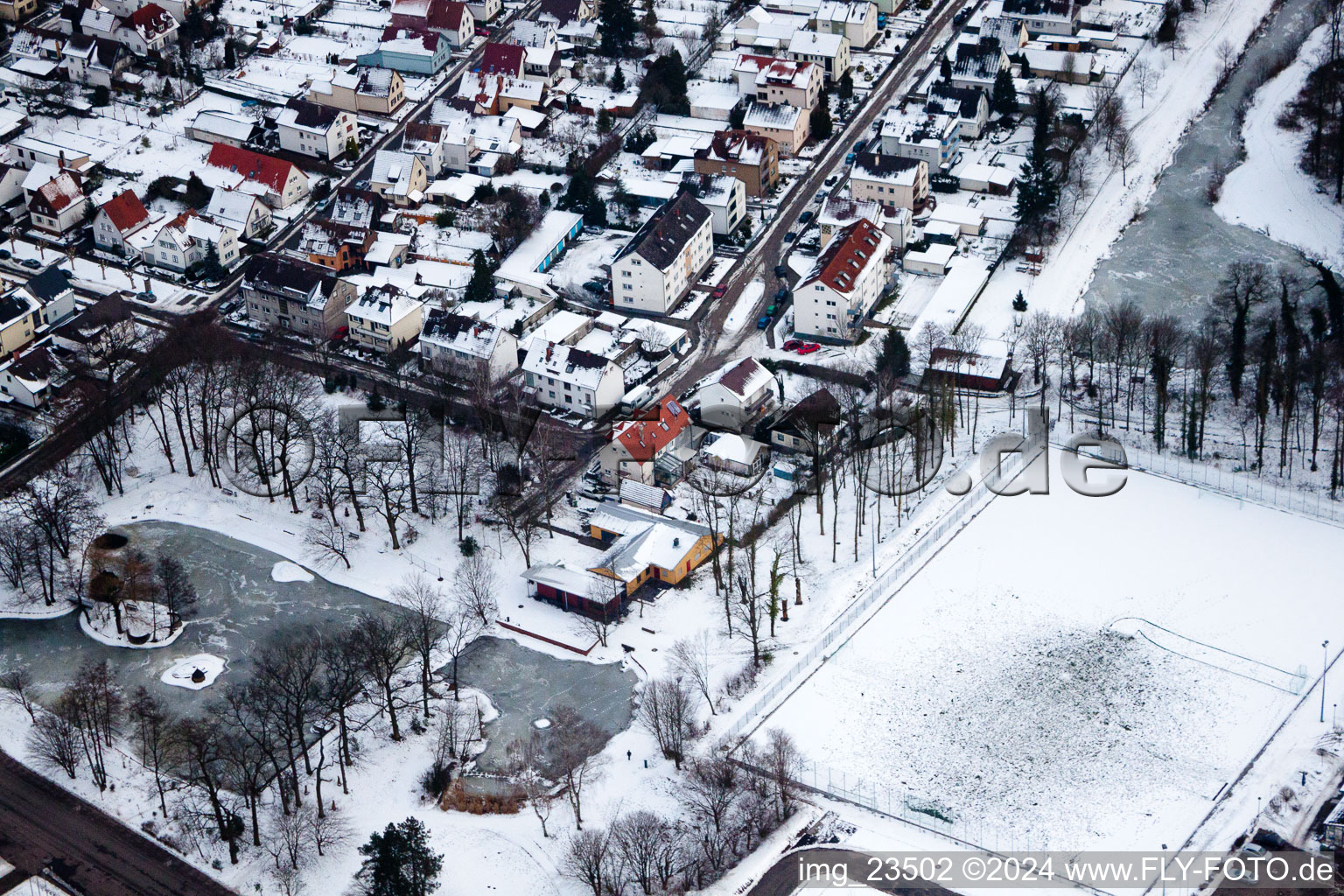 Renovated Schwanenweier and new artificial turf pitch of the Bienwaldstadion in frost break in Kandel in the state Rhineland-Palatinate, Germany