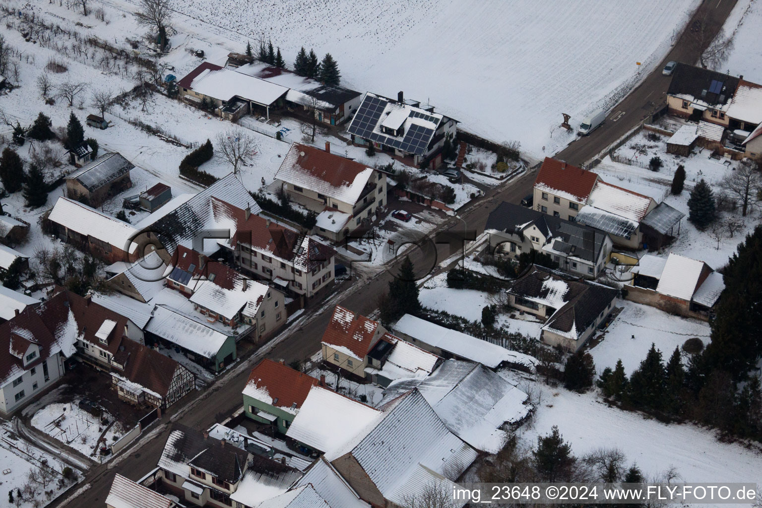 In the snow in winter in the district Kleinsteinfeld in Niederotterbach in the state Rhineland-Palatinate, Germany from the plane