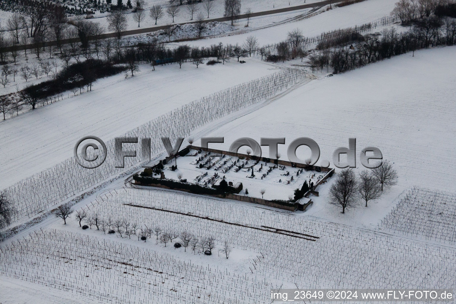 Cemetery in the snow in the district Kleinsteinfeld in Niederotterbach in the state Rhineland-Palatinate, Germany