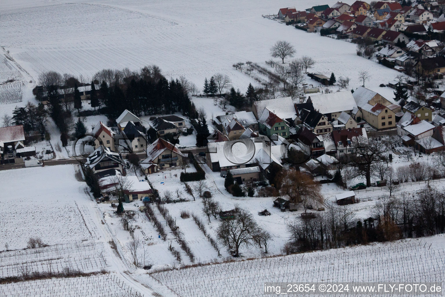 In the snow in winter in the district Kleinsteinfeld in Niederotterbach in the state Rhineland-Palatinate, Germany viewn from the air