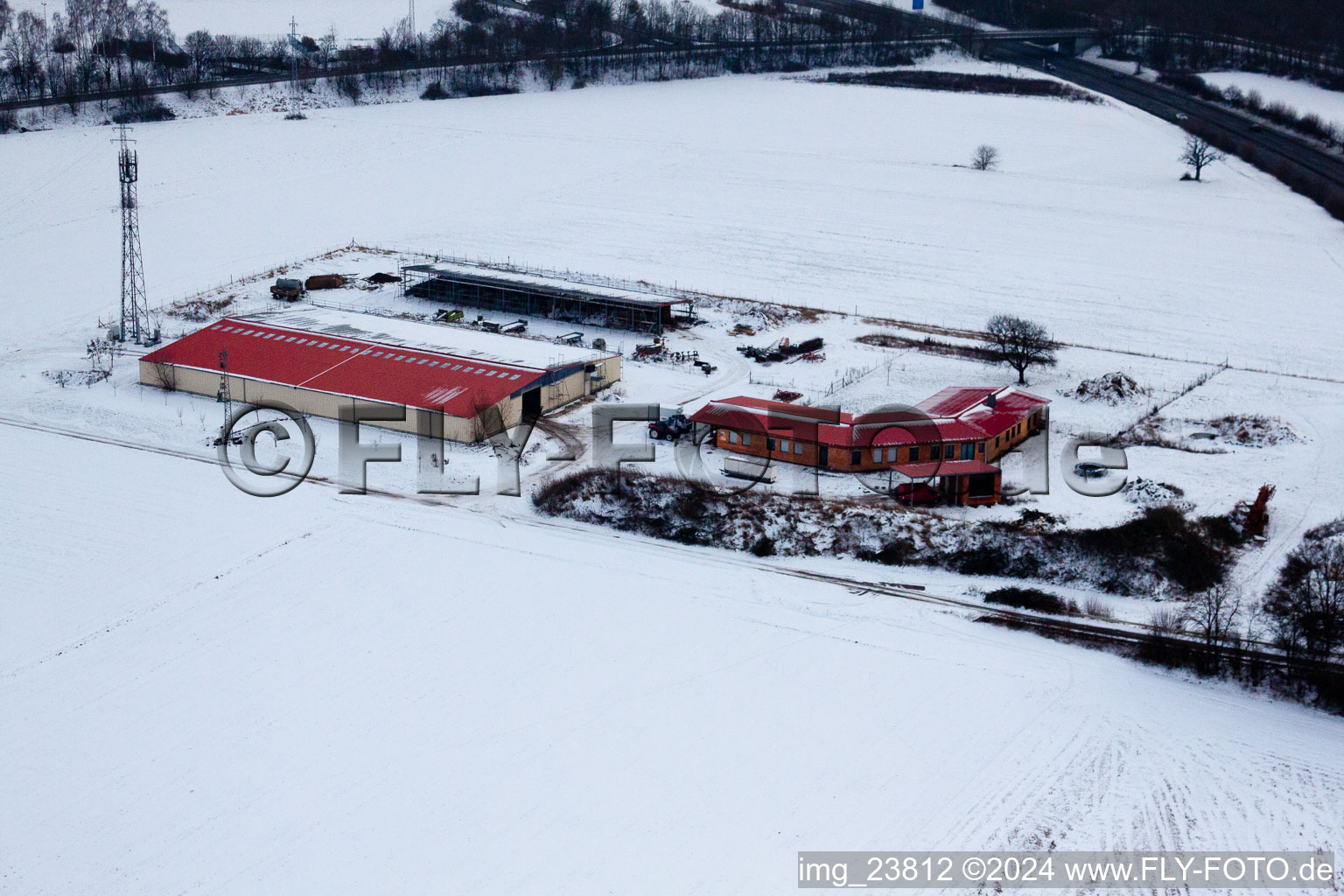 Chicken farm egg farm in winter with snow in Erlenbach bei Kandel in the state Rhineland-Palatinate, Germany