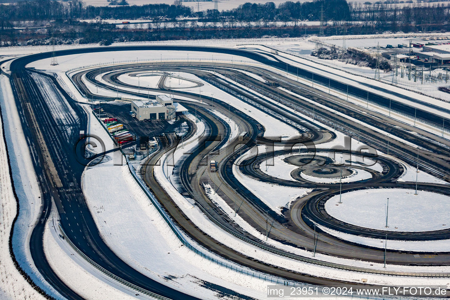 Wintry snowy Racecourse of the Daimler truck testing course in the district Industriegebiet Woerth-Oberwald in Woerth am Rhein in the state Rhineland-Palatinate, Germany