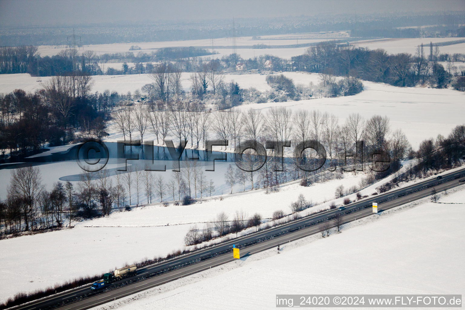 Winter break at the quarry lake in Rheinzabern in the state Rhineland-Palatinate, Germany