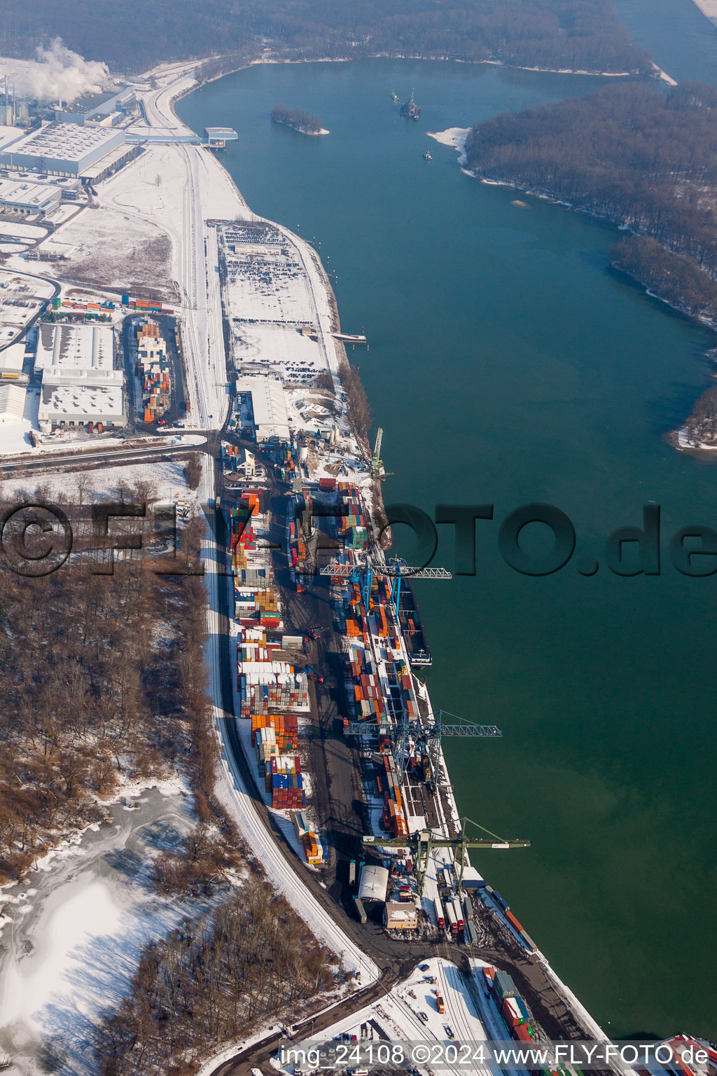 Wintry snowy Container Terminal in the inland port of Contargo Woerth-Karlsruhe GmbH on Rhine in the district Industriegebiet Woerth-Oberwald in Woerth am Rhein in the state Rhineland-Palatinate, Germany