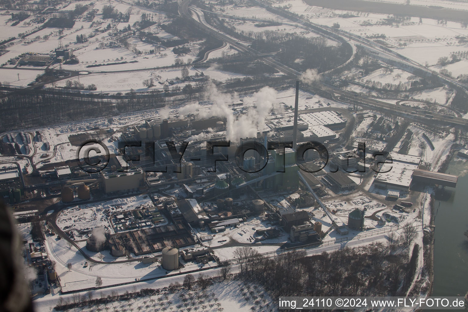 Aerial view of Maxau, Stora Enso paper mill in winter in the district Knielingen in Karlsruhe in the state Baden-Wuerttemberg, Germany