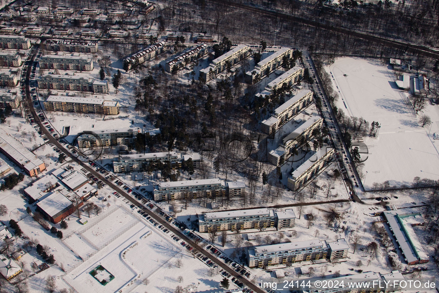 Tennesseeallee in winter with snow in the district Nordstadt in Karlsruhe in the state Baden-Wuerttemberg, Germany