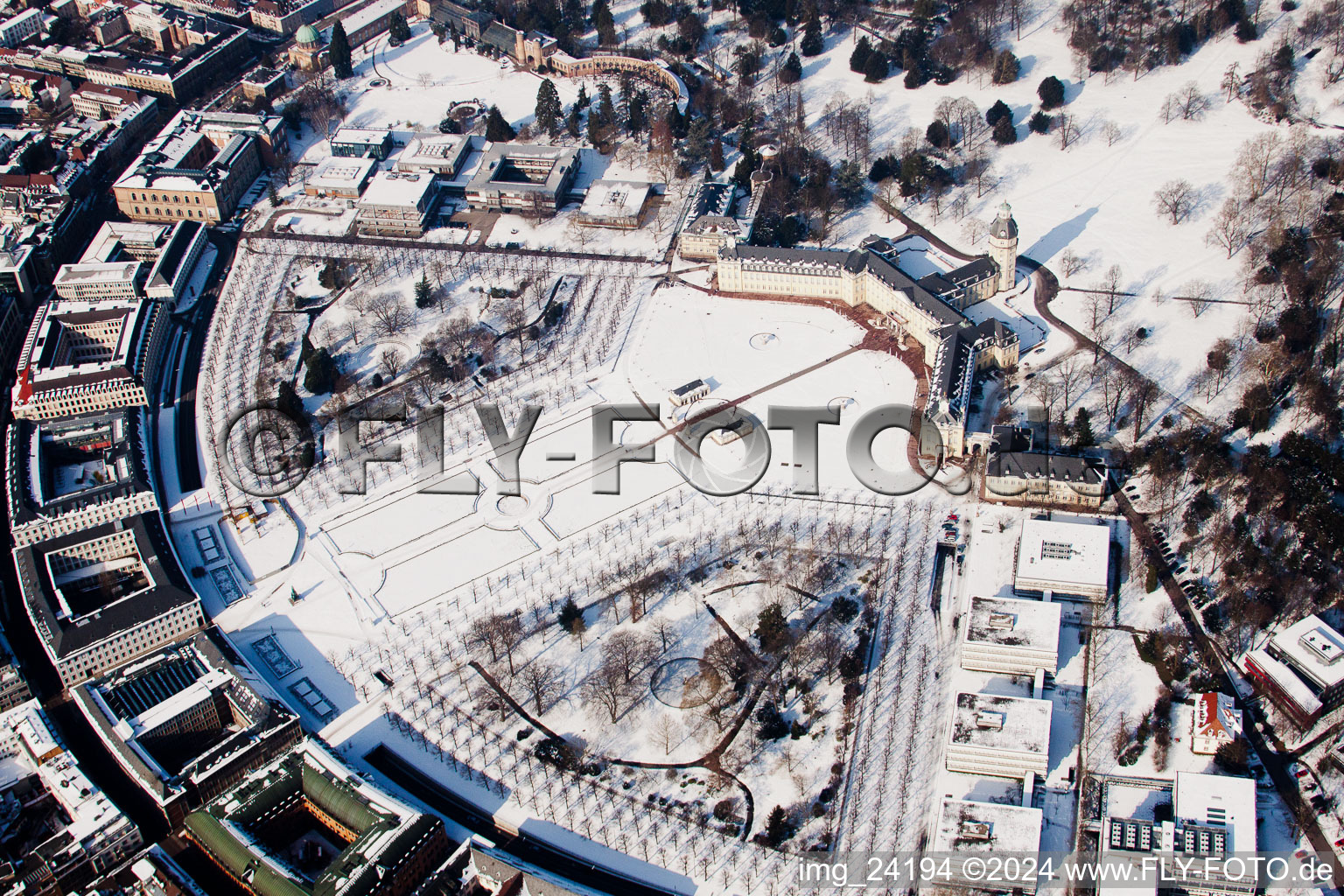 Winterly snow in the park of the castle Karlsruher Schloss in Karlsruhe in the state Baden-Wurttemberg