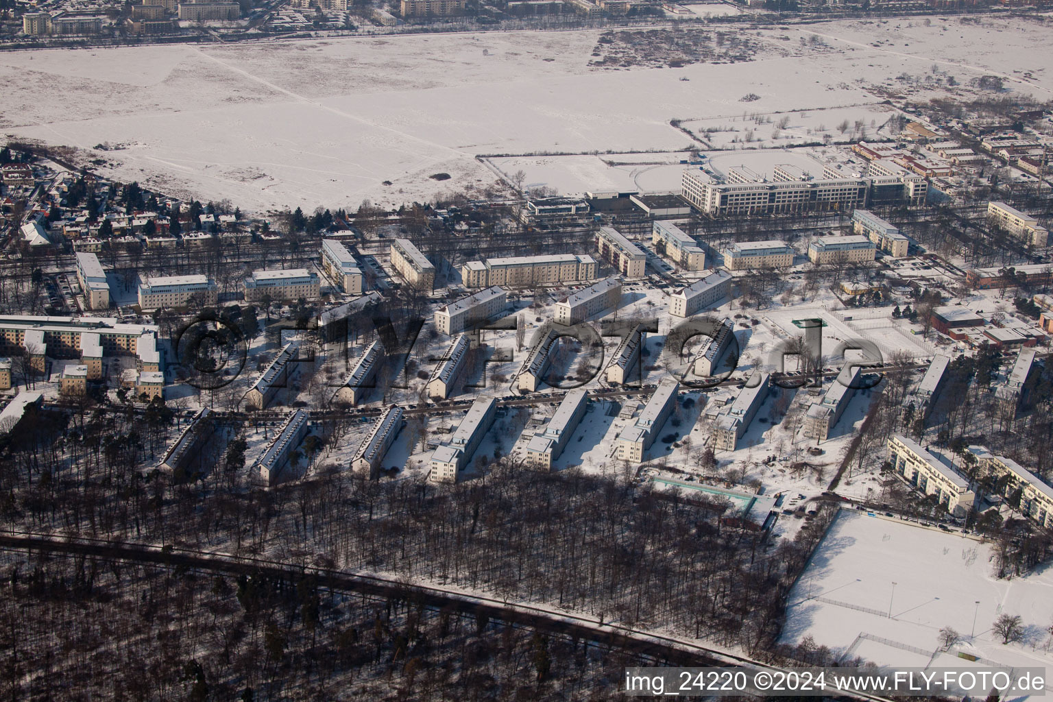 Tennesseeallee in winter with snow in the district Nordstadt in Karlsruhe in the state Baden-Wuerttemberg, Germany from above