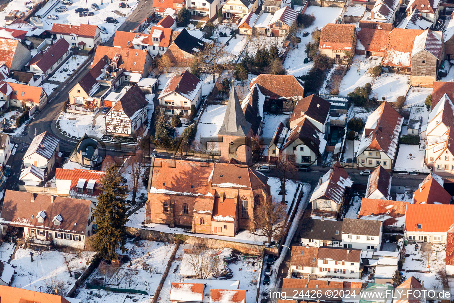 Wintry snowy Church building in the village of in Rohrbach in the state Rhineland-Palatinate, Germany