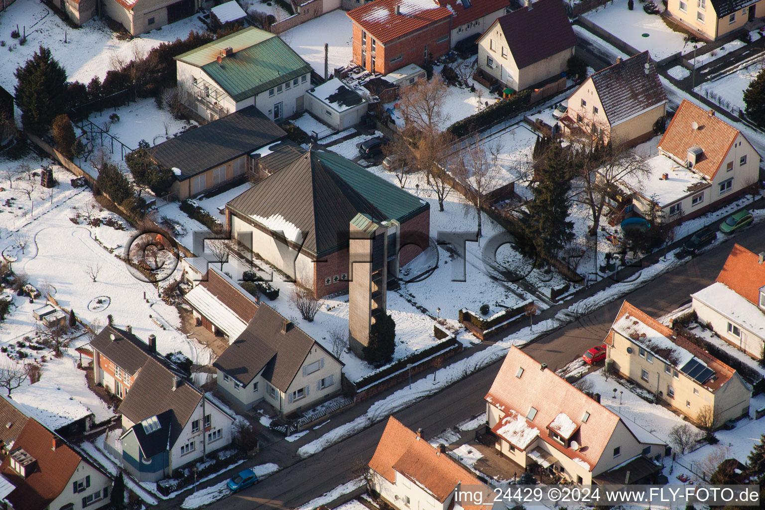 Aerial view of Wintry snowy Town View of the streets and houses of the residential areas in the district Ingenheim in Billigheim-Ingenheim in the state Rhineland-Palatinate