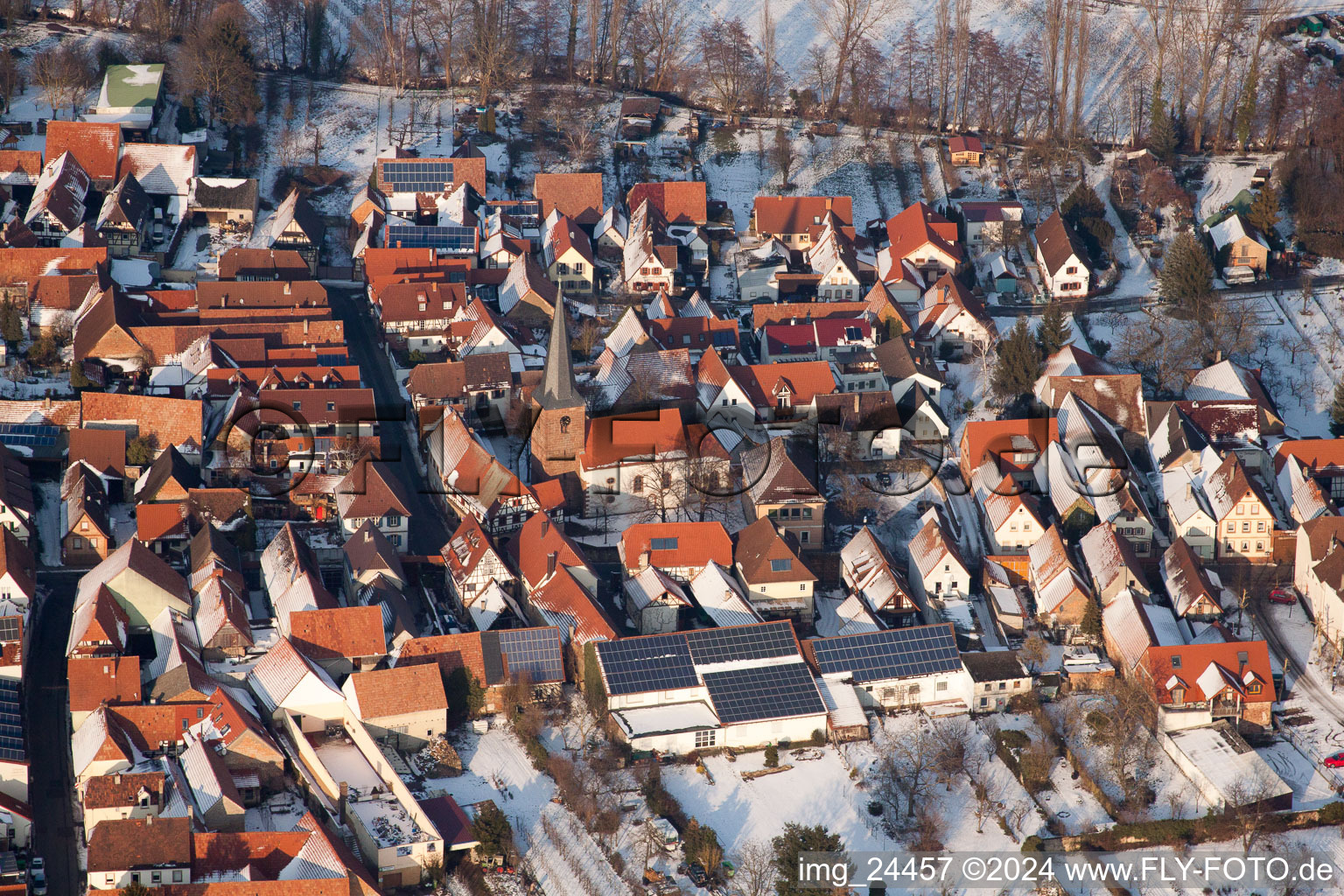 Winter snow-covered village in the district Heuchelheim in Heuchelheim-Klingen in the state Rhineland-Palatinate, Germany