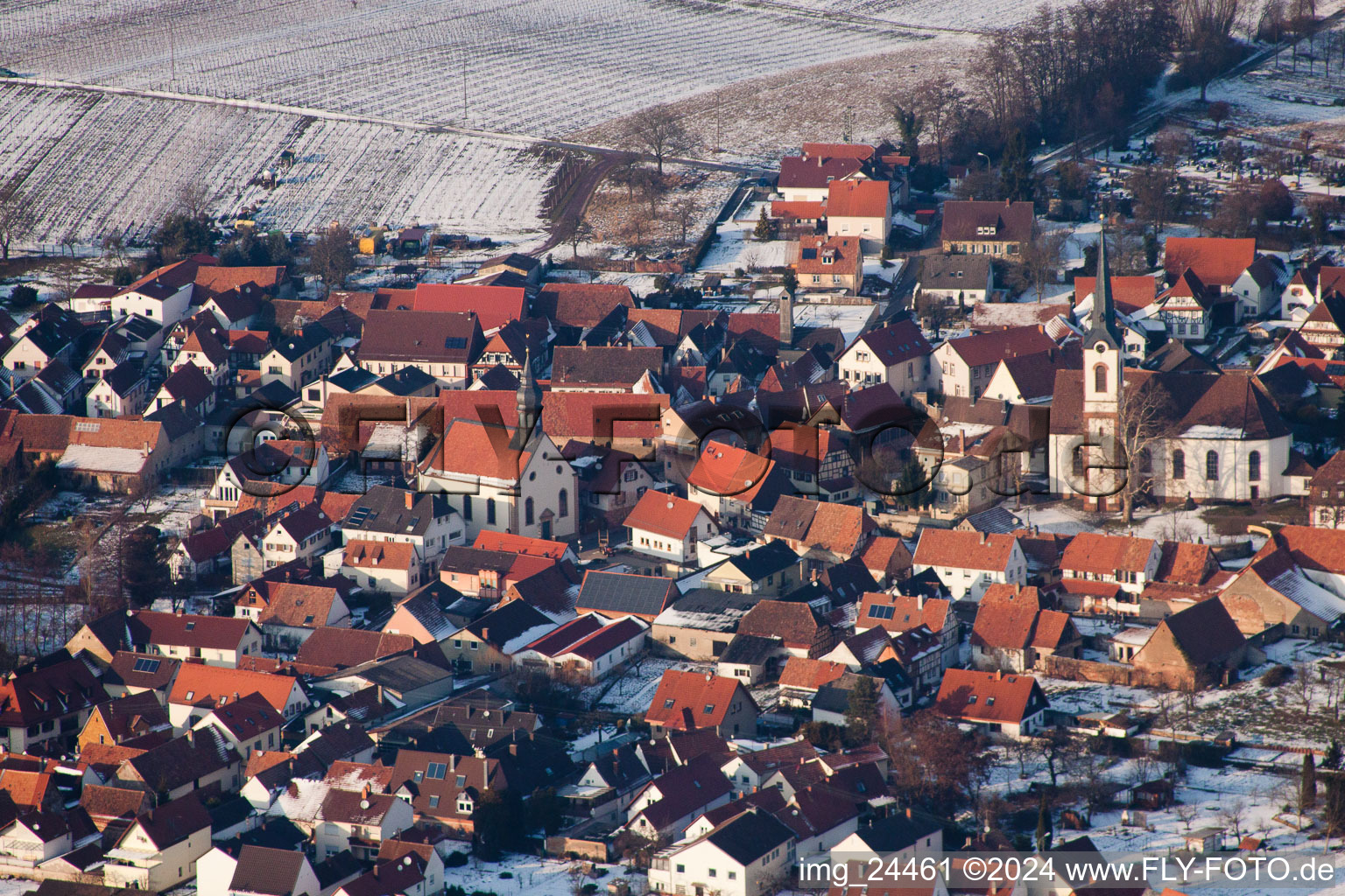 Oblique view of Winter snow covered village view in Göcklingen in the state Rhineland-Palatinate, Germany