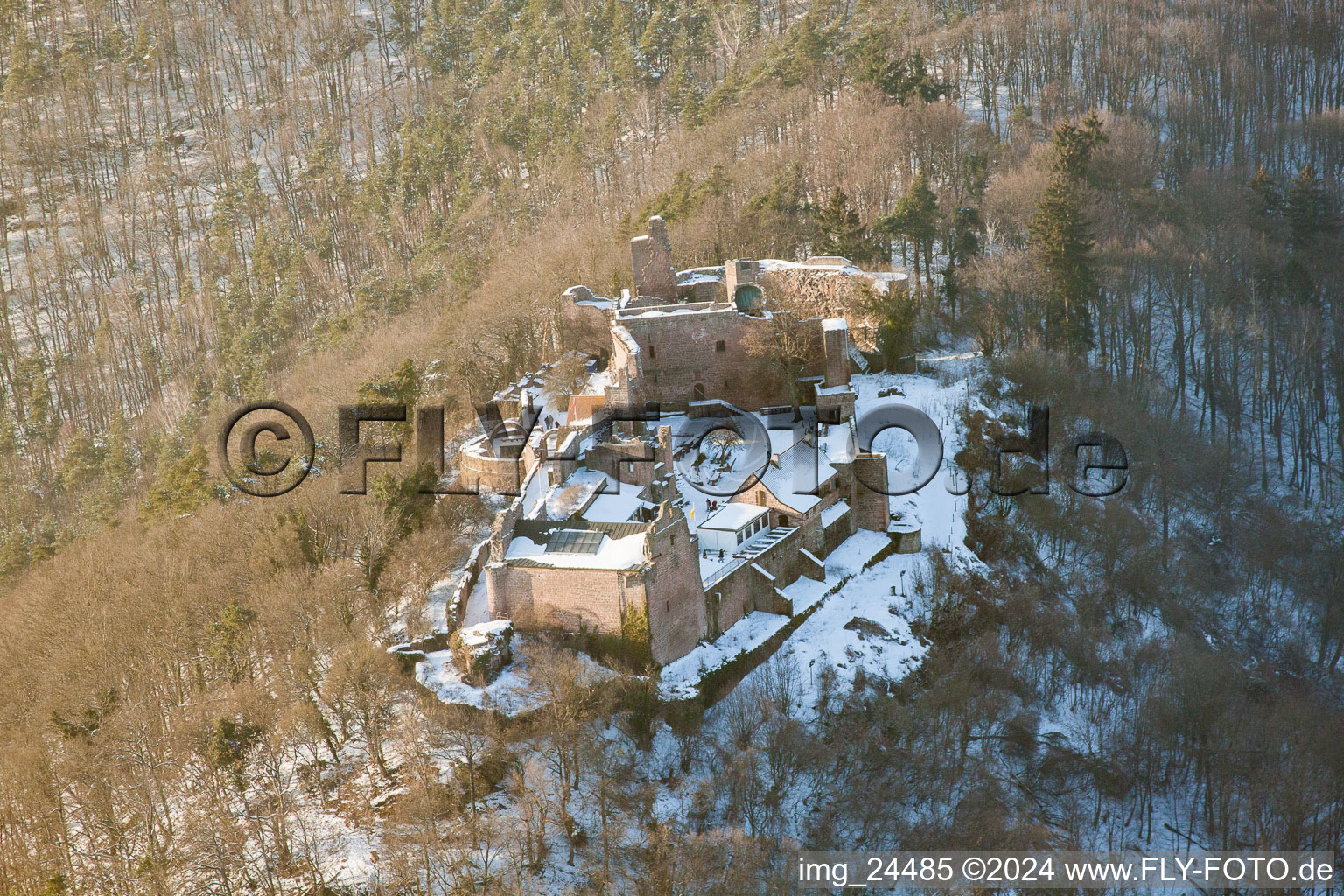 Aerial photograpy of Wintry snowy Ruins and vestiges of the former castle and fortress Burgruine Madenburg in Eschbach in the state Rhineland-Palatinate