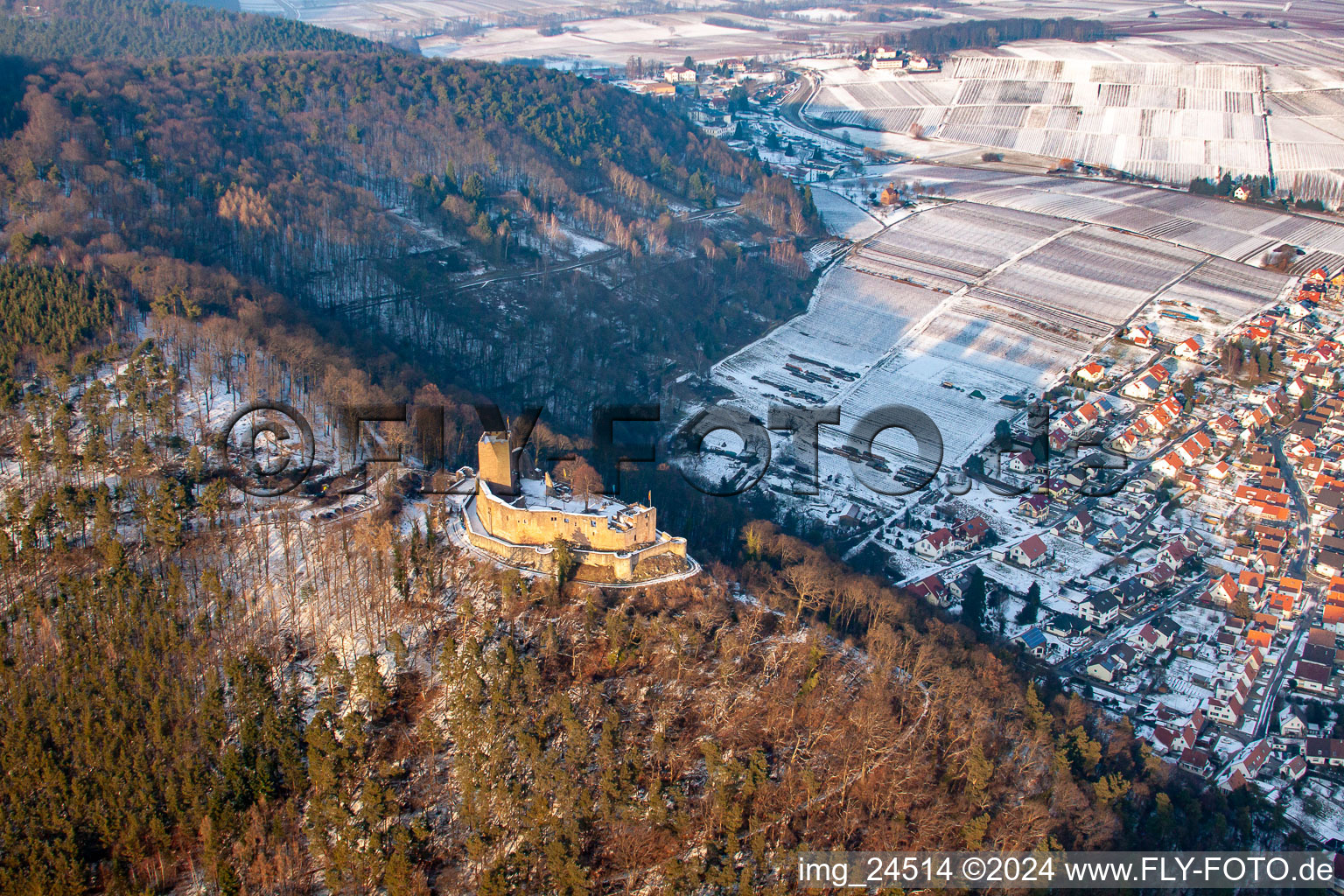 Aerial view of Wintry snowy Ruins and vestiges of the former castle and fortress Burg Landeck in Klingenmuenster in the state Rhineland-Palatinate, Germany